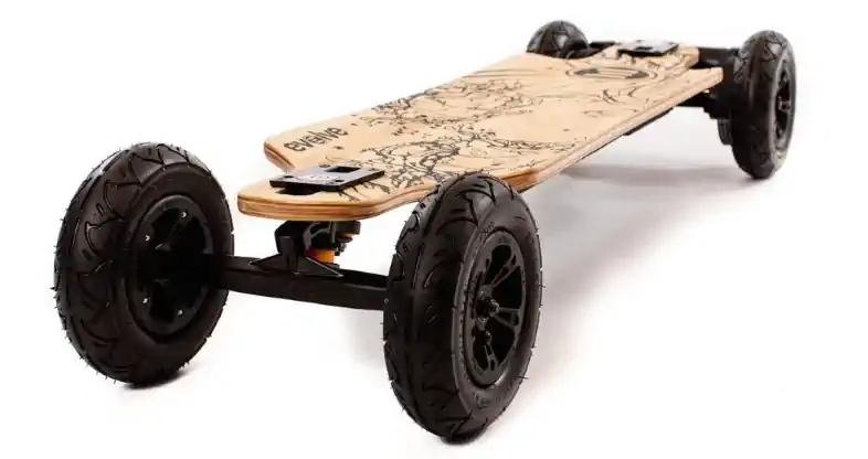 Evolve Bamboo GT electric skateboard climbing a steep hill demonstrating its powerful performance.